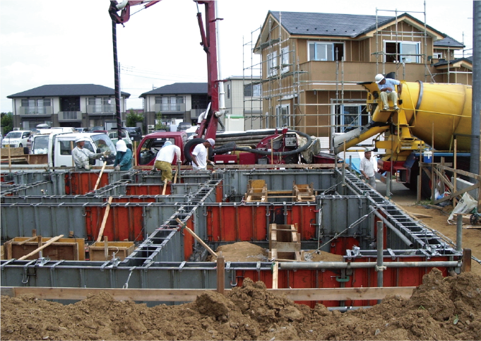 コンクリート打設現場での供試体採取